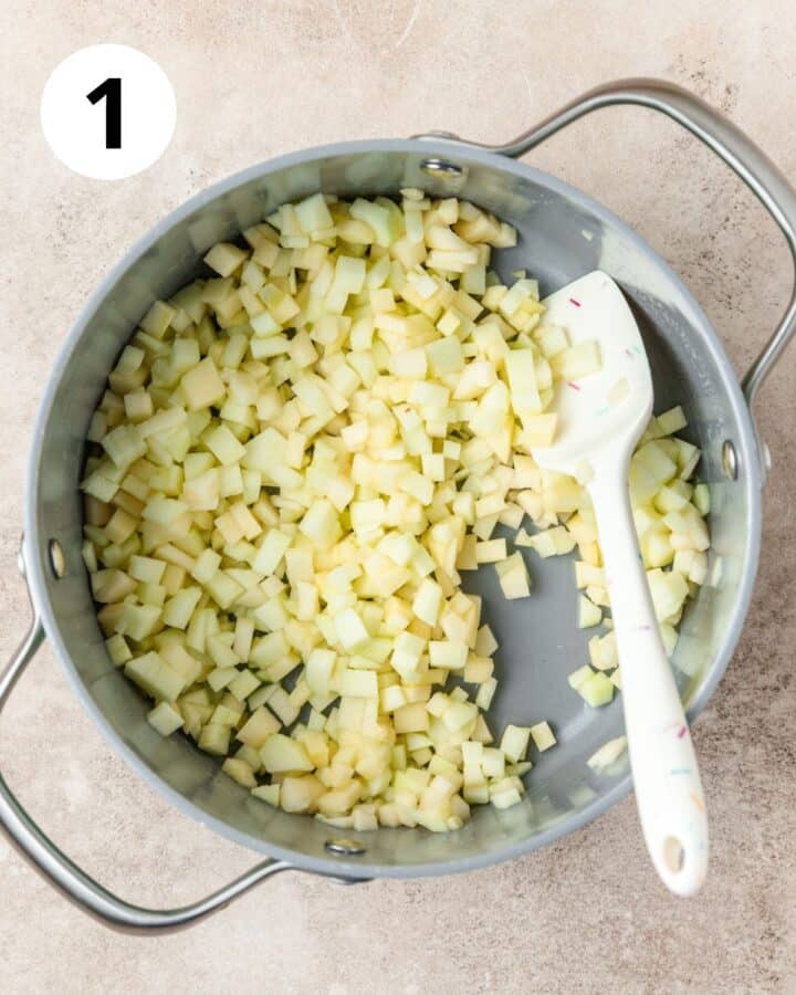 finely diced apples in pot.